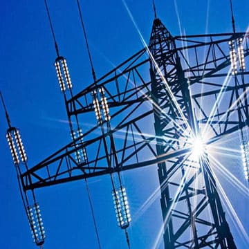 High-voltage transmission tower and power distribution network